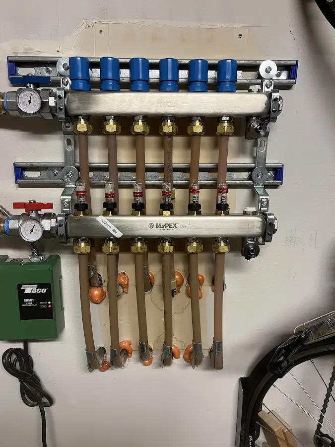 Plumber performing Leak Detection at a residential property in Belfast